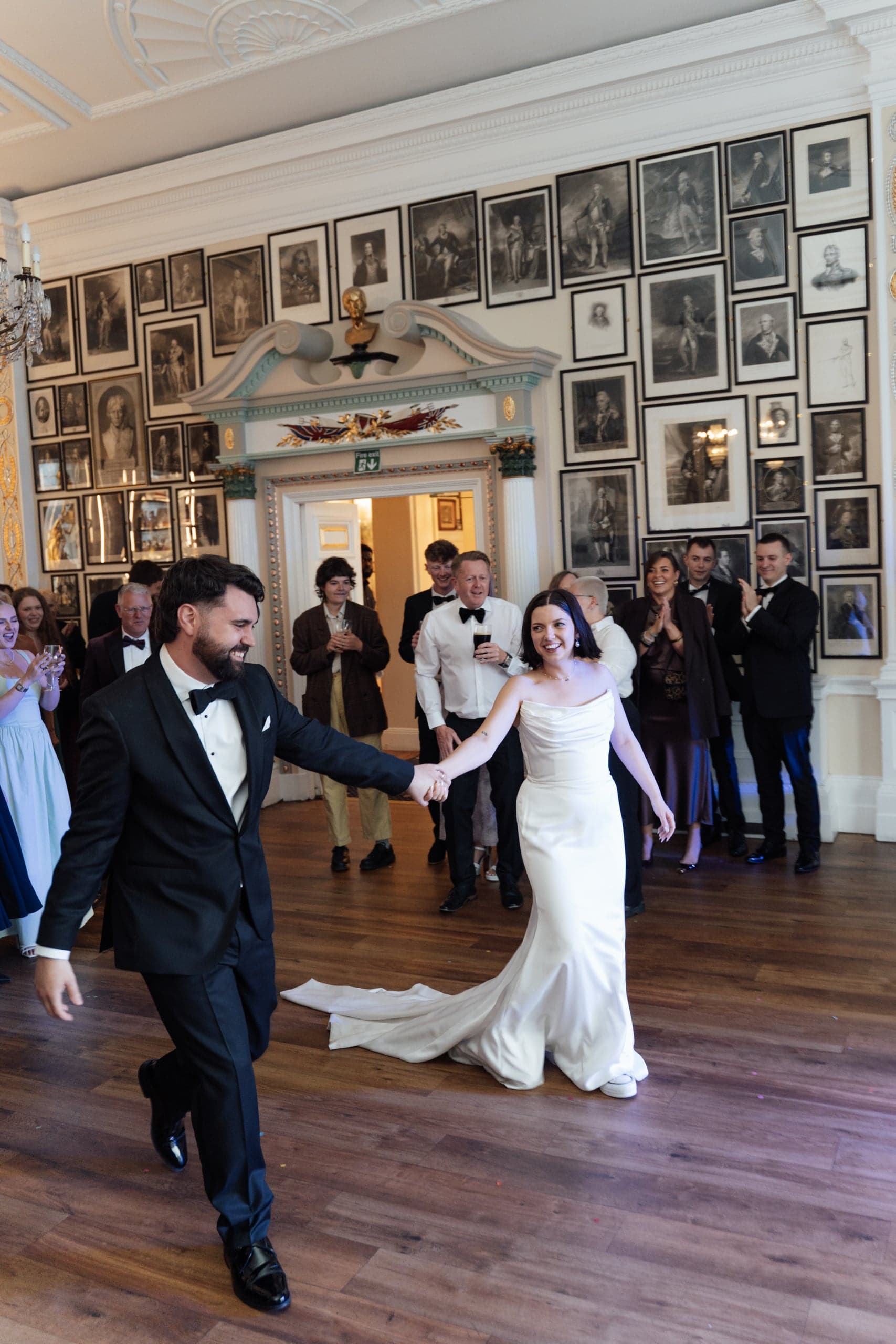 Kirsty and Jamie dancing with guests at their Trafalgar Tavern wedding reception