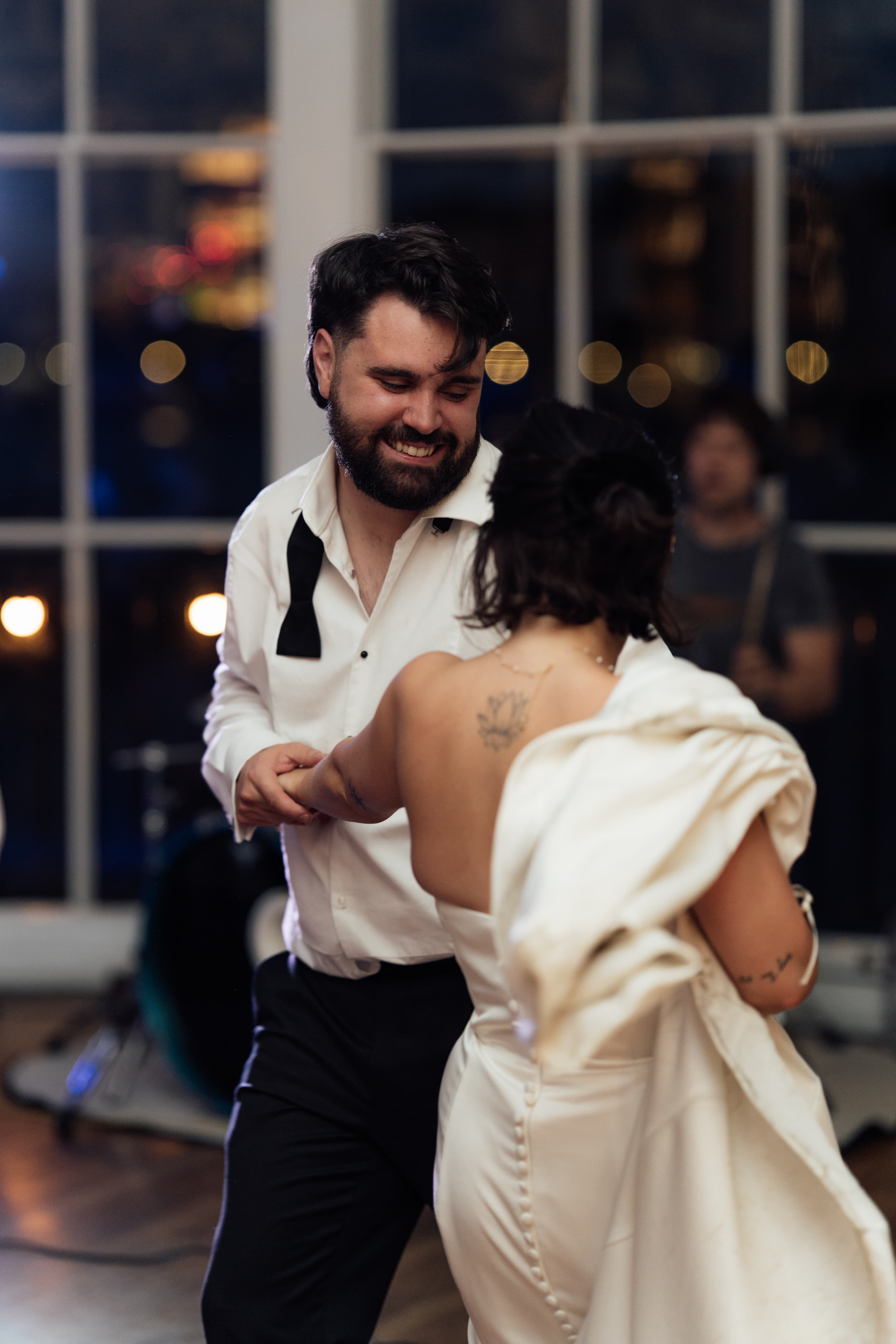 Bride and groom Kirsty and Jamie dancing together during their wedding celebration