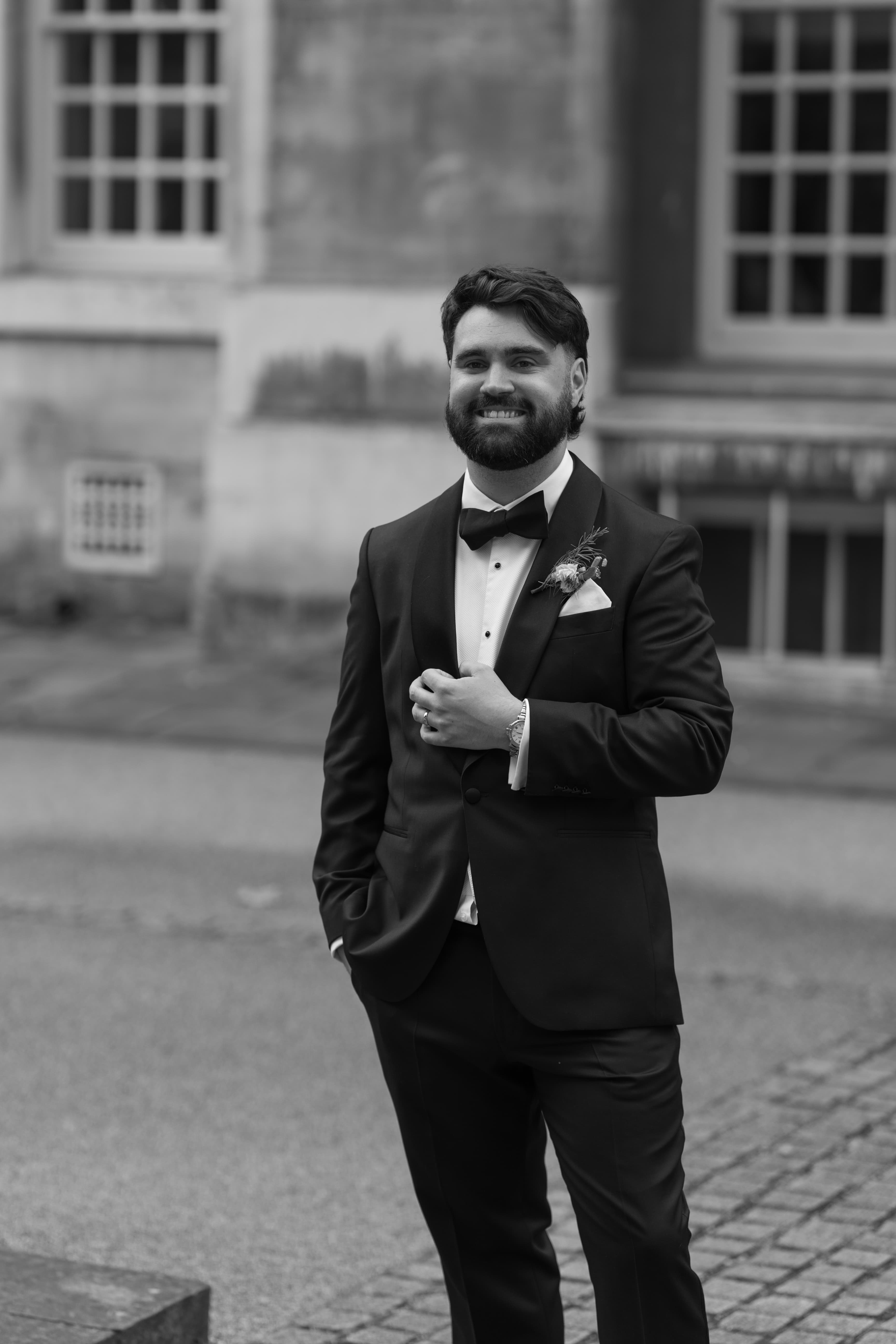 Portrait of groom Jamie in elegant wedding attire