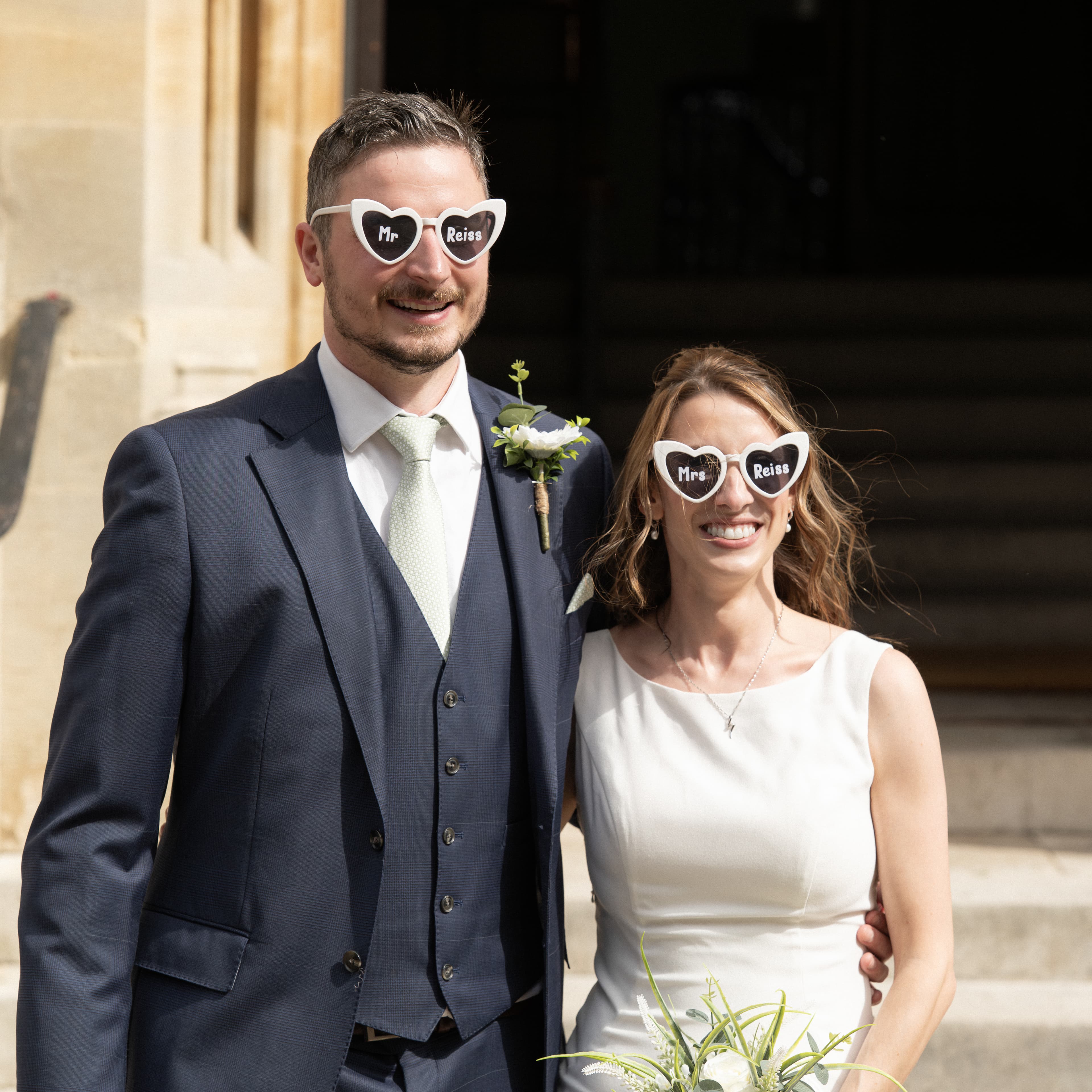 Wedding couple sitting on bench in romantic outdoor setting - follow @thelucks.photography on Instagram